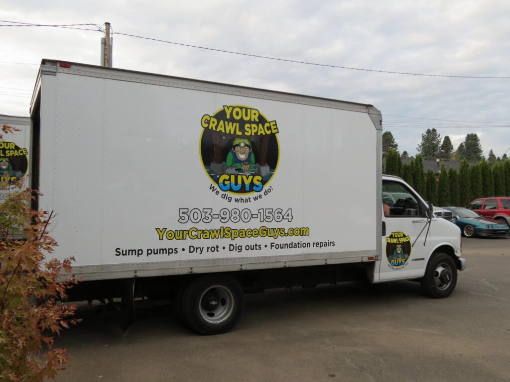 Your Crawl Space Guys Truck with Brand Logo